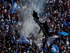 Fans celebrate in Buenos Aires, Argentina on Dec. 18, 2022.