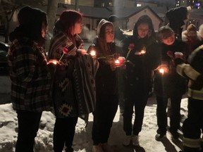 Mourners held roses and candles on Thursday evening at a vigil in Winnipeg held to mourn Morgan Harris who is now one of four women alleged to have been killed by Jeremy Anthony Michael Skibicki. Dave Baxter/Winnipeg Sun/Local Journalism Initiative