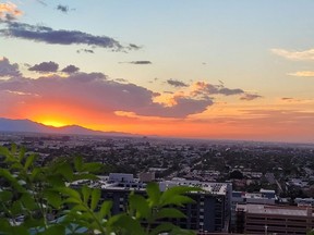 A sunset is viewed from the Skysill Rooftop Lounge in Tempe, Ariz.