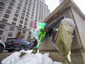 Flowers at the scene of a shooting from the previous night that left six dead, including the shooter at a condo building on Jane St, just north of Rutherford Rd. in Vaughan, On. on Monday December 19, 2022.