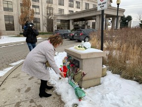 Marilyn Iafrate, a Vaughan city councillor, dropped off five bouquets of flowers to the memorial for the five people shot to death at a Jane St. and Rutherford Rd. condo Sunday night.