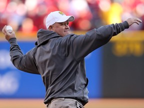 Former Cincinnati Reds pitcher Tom Browning throws out the ceremonial first pitch before the Reds take on the San Francisco Giants at the Great American Ball Park on October 9, 2012 in Cincinnati, Ohio.
