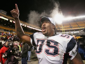 Linebacker Willie McGinest of the New England Patriots celebrates at Heinz Field on January 23, 2005 in Pittsburgh.