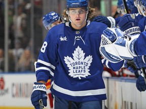 Maple Leafs winger William Nylander celebrates a goal against the Calgary Flames on Saturday at Scotiabank Arena. Nylander had a career-high five points in Toronto's overtime win.