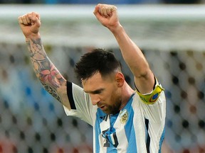 Argentina's forward Lionel Messi celebrates after qualifying to the next round after defeating Australia 2-1 in the Qatar 2022 World Cup round of 16 football match between Argentina and Australia at the Ahmad Bin Ali Stadium in Al-Rayyan, west of Doha on December 3, 2022.