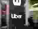 In this file photo taken on May 08, 2019 an Uber logo is seen outside the company's headquarters in San Francisco, California.