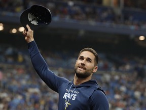 Tampa Bay Rays' Kevin Kiermaier gestures to fans after a video tribute to him was played during the second inning of the team's baseball game against the Toronto Blue Jays on Saturday, Sept. 24, 2022, in St. Petersburg, Fla.