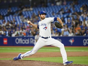 Toronto Blue Jays relief pitcher Jordan Romano (68) throws during a game against the Detroit Tigers, in Toronto on Thursday, July 28, 2022.