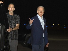 U.S. President Joe Biden arrives at Henry E. Rohlsen Airport, in St. Croix, U.S. Virgin Islands, late Tuesday, Dec. 27, 2022. Biden and his family are travelling to St. Croix to celebrate the New Year.
