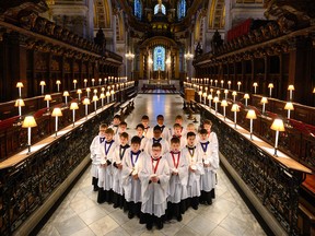 Members of the St Paul's choir are seen during a photocall at St Paul's Cathedral on December 23, 2022 in London, England.