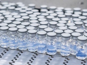 Vials of Pfizer's updated COVID-19 vaccine is seen during production in Kalamazoo, Mich., in an Aug. 2022, handout photo.