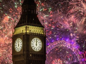 Fireworks light up the London skyline over Big Ben and the London Eye just after midnight on January 1, 2023 in London, England. (Dan Kitwood/Getty Images)