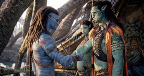From left, Sam Worthington as Jake Sully, Kate Winslet as Ronal and Cliff Curtis as Tonowari in Avatar: The Way of Water.