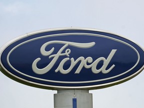 A Ford logo is seen on signage