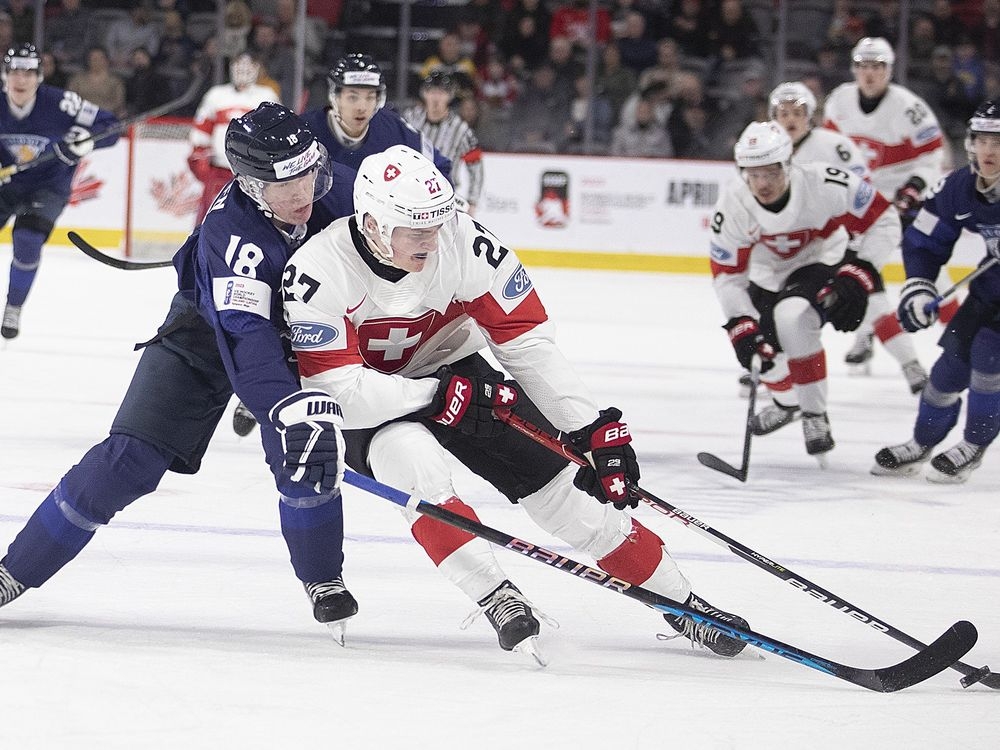 Switzerland opens world juniors with 3-2 overtime win over Finland ...