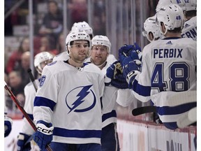 Tampa Bay Lightning forward Brandon Hagel celebrates with teammates after scoring a goal against the Montreal Canadiens during the second period at the Bell Centre.