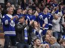 Toronto Maple Leafs fans react as Toronto Maple Leafs forward Mitchell Marner (not pictured) continues a consecutive point streak on an assist on a goal by forward William Nylander (not pictured) against the Calgary Flames during the first period at Scotiabank Arena. 
