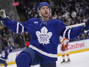 Toronto Maple Leafs forward Michael Bunting celebrates after scoring the game tying goal against Calgary Flames during the third period at Scotiabank Arena.
