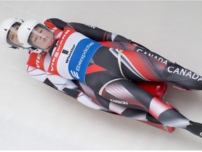 Caitlin Nash and Natalie Corless, of Whistler, B.C., Canada are seen during the first run of doubles luge during the Viessmann Luge World Cup in Whistler, B.C., Saturday, Dec. 14, 2019. Nash and Corless are the first all woman double luge team in the history of the sport.