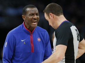 Pistons head coach Dwane Casey argues with referee Josh Tiven, right, during the second half of an NBA game against the Magic in Detroit, Wednesday, Dec. 28, 2022.