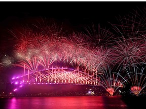 New Year’s Eve fireworks light up the sky over the Harbour Bridge in Sydney on January 1, 2023.