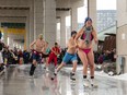 People stripped down and taking part in Polar Bear Skate at The Bentway.