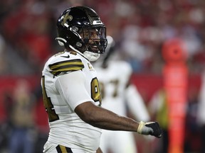 New Orleans Saints defensive end Cameron Jordan (94) reacts between plays in the first half of an NFL football game against the Tampa Bay Buccaneers in Tampa, Fla., Monday, Dec. 5, 2022.