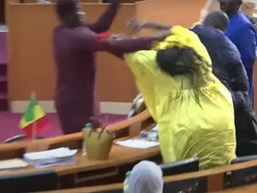 Senegal's opposition member of parliament Massata Samb slaps  Amy Ndiaye Gniby of the ruling Benno Bokk Yakaar (BBY) coalition in a brawl captured on video.