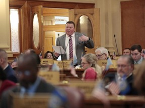 South Dakota state Rep. Chris Karr, a Republican, speaks in the House chamber on March 28, 2022, in Pierre, S.D.