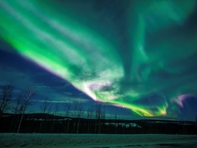 Northern lights, also called Aurora Borealis, is seen in the sky over Overkalix, Sweden March 5, 2022. Picture taken March 5, 2022.