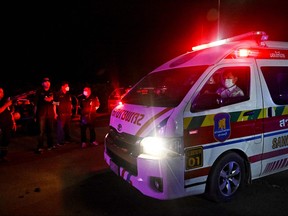 The bodies of deceased sailors are transported by ambulances after being dropped by helicopter, during the search for survivors of the capsizing of the Thai naval vessel HTMS Sukhothai about 37 kilometres off the coast on Sunday night, at Bang Saphan Pier in Prachuap Khiri Khan district, on Dec. 20, 2022.