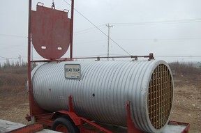 A sample bear trap is set up outside the Polar Bear Holding Facility in Churchill. (It is welded open, so nobody can get stuck inside.) Meat would hang from a hook in front of the grate, so when a bear enters and eats it, the door would close behind it. The bear would then be taken to the Holding Facility. Laura Shantora Nelles/Toronto Sun