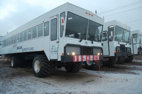 The Lazy Bear Lodge Arctic Crawlers are lined up ready to go out onto the tundra to look for polar bears. The windows in front slant forward, enabling viewing directly in front of the vehicle. Laura Shantora Nelles/Toronto Sun