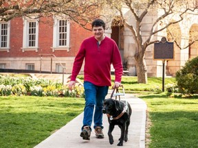 Robert Hampson and guide dog Spokane.