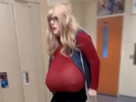 Teacher wearing huge fake breasts to class sparks review of standards
