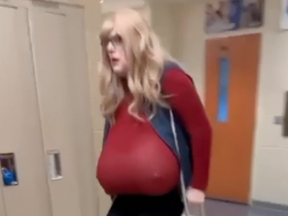 Trans teacher with Z cup sized boobs dresses as a normal man