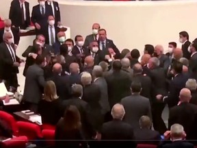 Legislators brawl in the Turkish parliament Tuesday, Dec. 6, 2022.