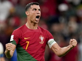 Portugal's Cristiano Ronaldo celebrates his side's opening goal during the World Cup group H soccer match between Portugal and Uruguay, at the Lusail Stadium in Lusail, Qatar, Monday, Nov. 28, 2022.