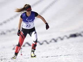 Natalie Wilkie of Canada competes during the women's middle distance free technique standing event of para cross country skiing at the 2022 Winter Paralympics, Saturday, March 12, 2022, in Zhangjiakou, China.