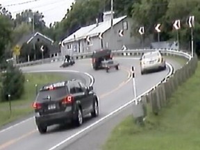 An image taken from a video that captured the moment before Félix-Antoine Gagné's motorcycle collided with Éric Rondeau's pickup truck on Highway 345 in Ste-Elisabeth on July 22, 2019.
