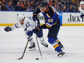 Pavel Buchnevich of the St. Louis Blues shoots the puck against Timothy Liljegren of the Toronto Maple Leafs in the third period at Enterprise Center on December 27, 2022 in St Louis, Missouri.