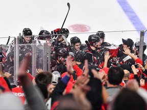 Team Canada celebrate their overtime victory against Team Slovakia in the quarterfinals of the 2023 IIHF World Junior Championship at Scotiabank Centre on January 2, 2023 in Halifax, Nova Scotia, Canada.  Team Canada defeated Team Slovakia 4-3.