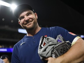 Liam Hendriks of the Chicago White Sox looks on after defeating the National League 5-2 in the 91st MLB All-Star Game at Coors Field on July 13, 2021 in Denver, Colorado.