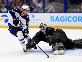 Kyle Connor #81 of the Winnipeg Jets scores a goal on Brian Elliott #1 of the Tampa Bay Lightning in the first period during a game  at Amalie Arena on April 16, 2022 in Tampa, Florida.
