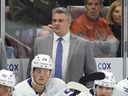 Sheldon Keefe behind the bench of the Toronto Maple Leafs agianst the Arizona Coyotes at Mullett Arena on December 29, 2022 in Tempe, Arizona.
