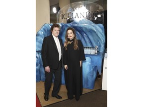 Jerry Schilling and Lisa Marie Presley with Icelandic Glacial at the 80th Annual Golden Globe Awards at The Beverly Hilton on Jan. 10, 2023 in Beverly Hills, Calif.