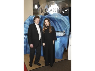 Jerry Schilling and Lisa Marie Presley with Icelandic Glacial at the 80th Annual Golden Globe Awards at The Beverly Hilton on Jan. 10, 2023 in Beverly Hills, Calif.