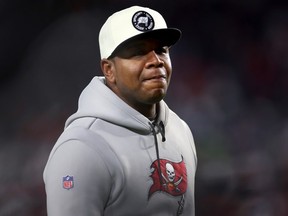 Offensive Coordinator Byron Leftwich of the Tampa Bay Buccaneers looks on prior to the game against the Dallas Cowboys in the NFC Wild Card playoff game at Raymond James Stadium on January 16, 2023 in Tampa, Florida.