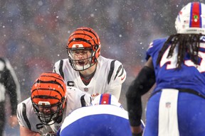 Bengals’ Joe Burrow calls a play against the Buffalo Bills during the third quarter on Jan. 22, 2023 in Orchard Park, N.Y. Bryan M. Bennett/Getty Images
