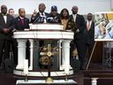 Flanked by the parents of Tyre Nichols and faith and community leaders, civil rights attorney Ben Crump speaks next to a photo of Nichols during a press conference on Jan. 27, 2023 in Memphis, Tenn.
